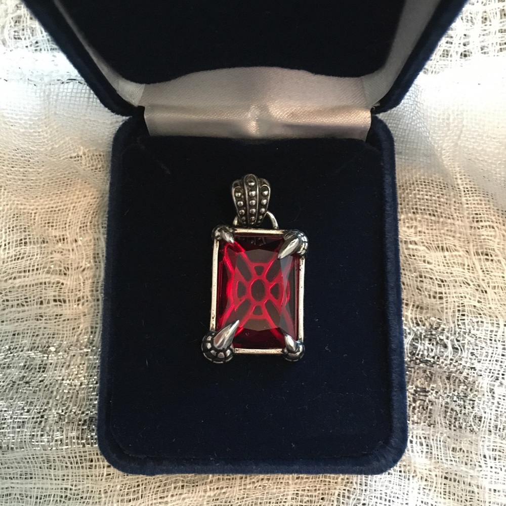 Dragon Claws holding a Blood red rectangle.